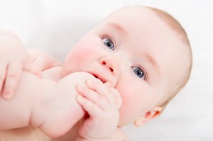 Image of baby. Putting your foot in your mouth is only cute with babies!