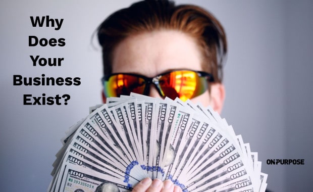 Image of man fanning one hundred dollar bills with the question, Why does your business exist?